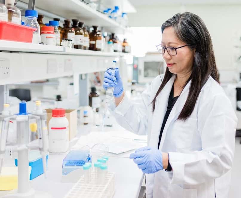 Prof. Dr. Gan Siew Hua inspecting samples in the University of Cyberjaya pharmacogenomics research laboratory