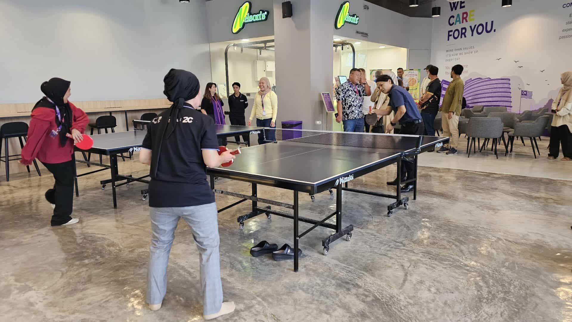 Students playing table tennis at The Gateway