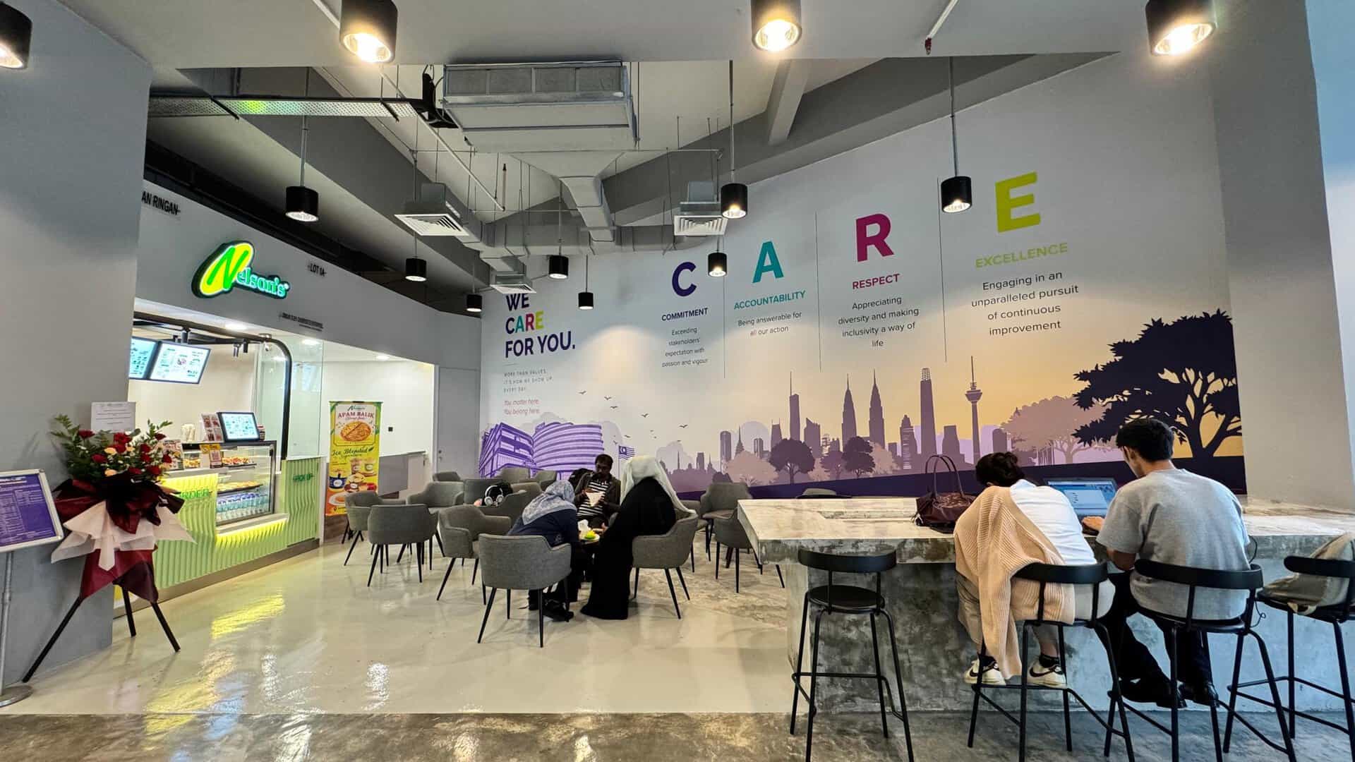 Open social space and mural at The Gateway